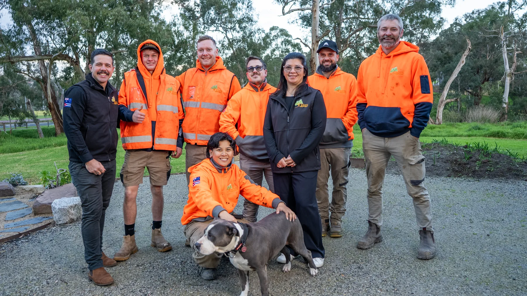 The Eden Building & Landscaping crew together on site, founder Eduardo with the landscaping, building and maintenance team